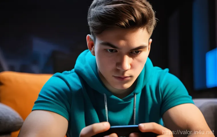발로란트 모바일에서의 변화 - A close-up of a young male gamer, 18-22 years old, intensely focused on a smartphone screen, his thu...